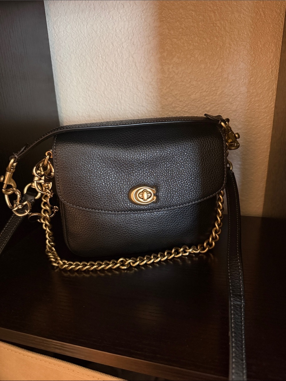 COACH CASSIE 19 | Black Leather Crossbody Bag with Gold Chain Accent